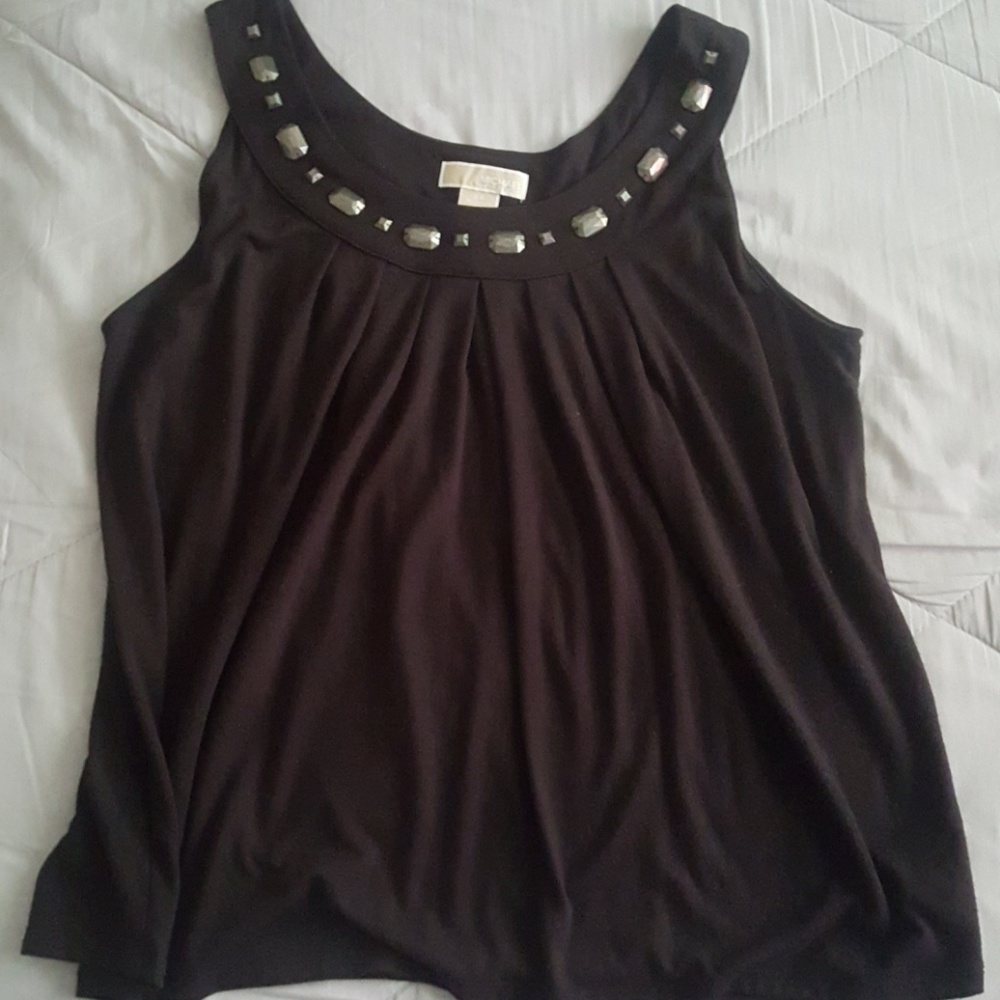 MK Sleeveless blouse with details on the neck
